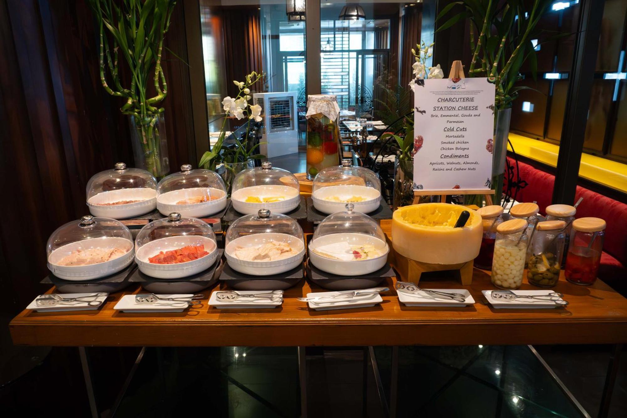 Tower Club At Lebua Hotel Bangkok Exterior photo A selection of cheese at a buffet